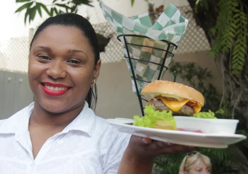 Serving food at Kaffe Fortaleza San Felipe