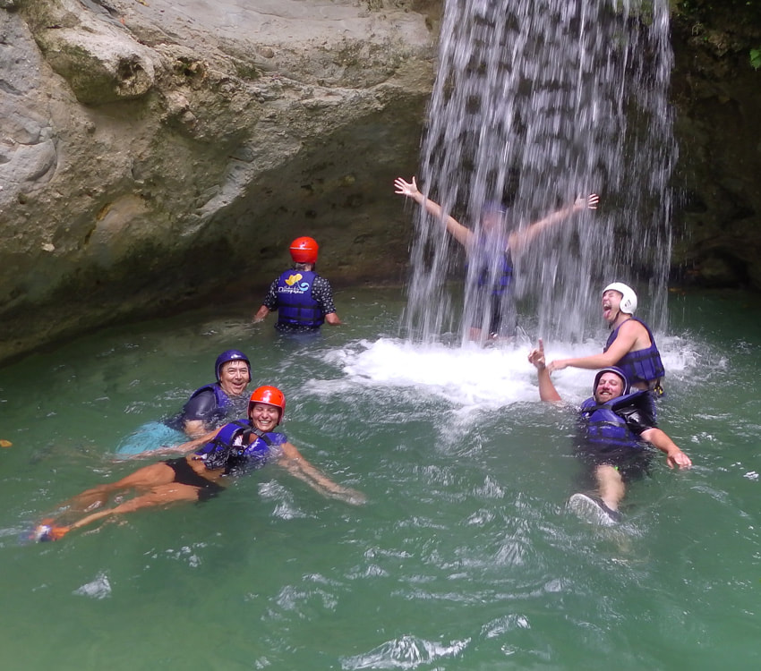 Happy people at Damajagua waterfalls excursion